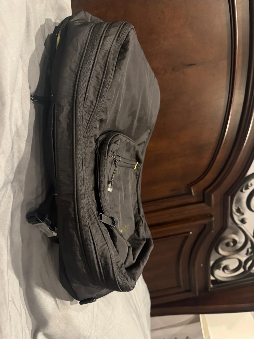 Calvin Klein Men's Black Backpack with Subtle Yellow Accents